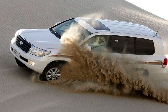 4hr Desert Safari: Sunset,Sunrise,Camel,Sand boarding,Inland Sea - The singing dunes and a useful pause