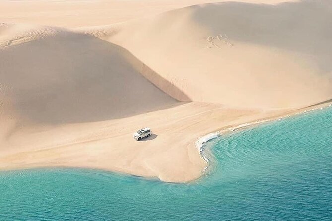 4hr Desert Safari: Sunset,Sunrise,Camel,Sand boarding,Inland Sea - The Inland Sea and the Saudi border view