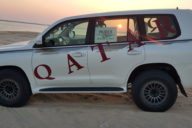 Desert Safari Adventure 4 hours from Doha with Pickup - Sandboarding after the vehicle ride
