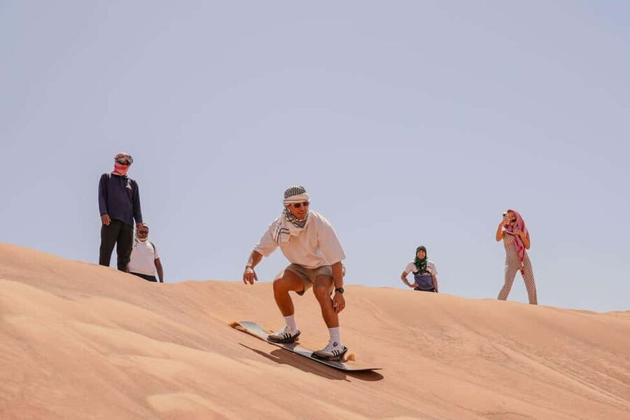 Desert Safari Dubai with Camel Ride, Sandboarding & Dinner - Self-drive quad biking at Lahbab