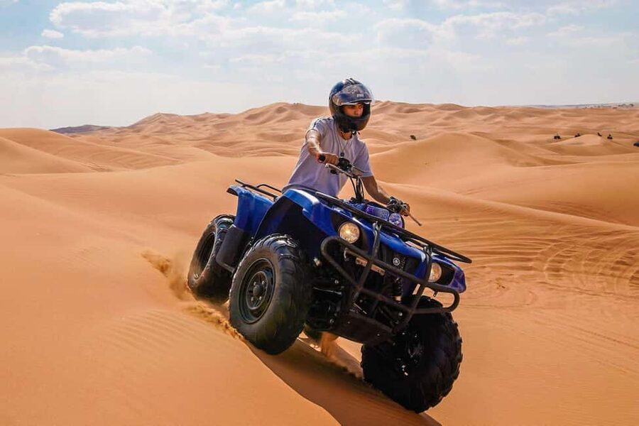 Desert Safari Dubai with Camel Ride, Sandboarding & Dinner - Dune bashing in a 4x4 Land Cruiser