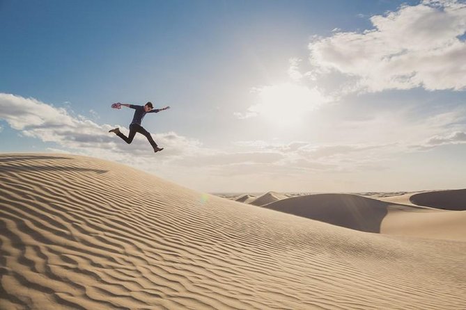 Desert safari, Dune bashing, sandboarding, camel, ATV Option - Quad biking over the sand