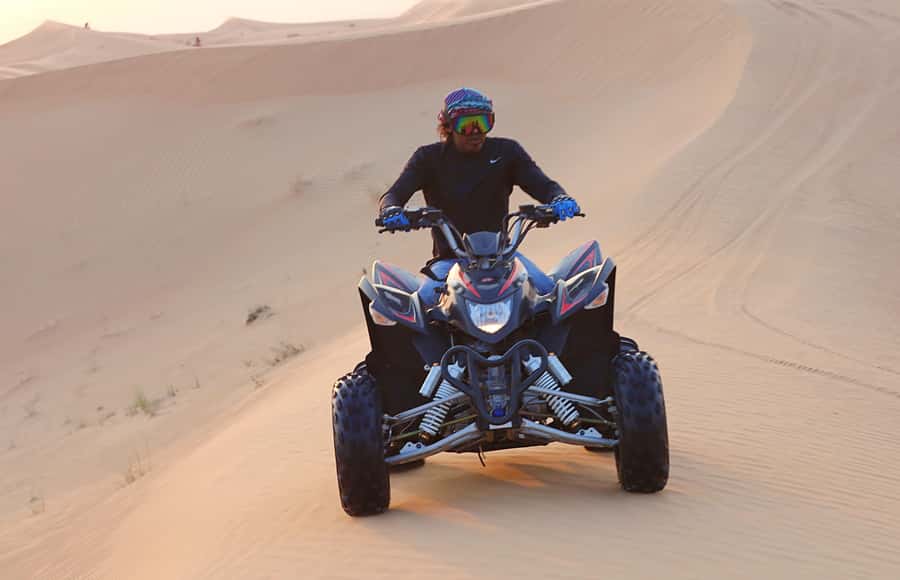Desert Safari, Quad Bike, Camel Ride, Falcon & Sandboarding - From Doha to the open desert