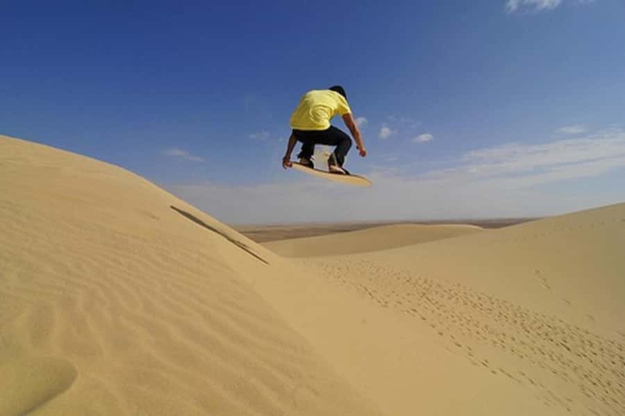 Desert Safari, Quad Bike, Camel Ride, Falcon & Sandboarding - Leaving Sealine Beach for dune bashing