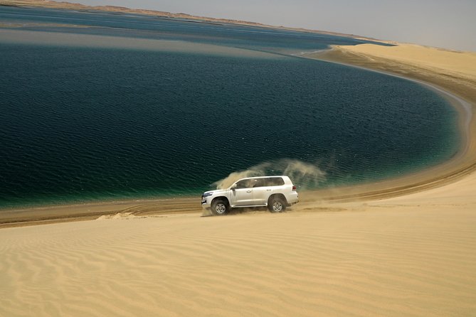 Desert Safari with Camel Ride, Sand Boarding & Inland Sea Tour in Doha - From Doha’s City Streets to Sealine Beach