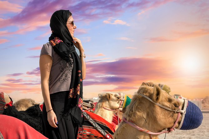 Desert Safari with Camel Ride, Sand Boarding & Inland Sea Tour in Doha - The Camel Stop: Fun, Brief, and Mostly for Photos