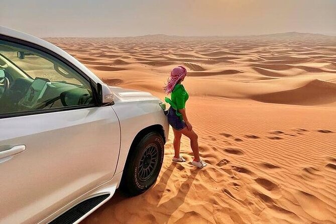 Desert Safari with Quad Bike Camel ride ,SandBoarding ,InalndSea - The 20-minute 250 cc quad bike session