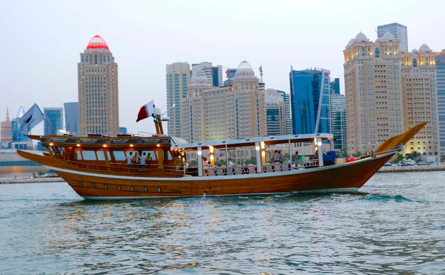 Doha: Arabic Dhow Cruise with Dinner, Tea & Coffee - A traditional dhow beside modern Doha