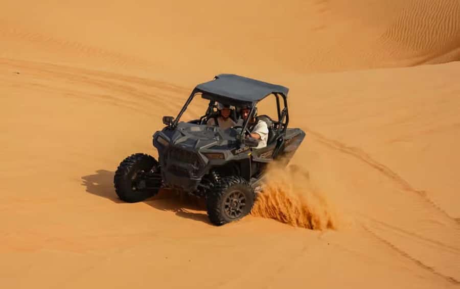 Doha: ATV Quad, Buggy Dune Bashing,Camel Ride & Sandboarding - Inland Sea Beach and the sunset hour