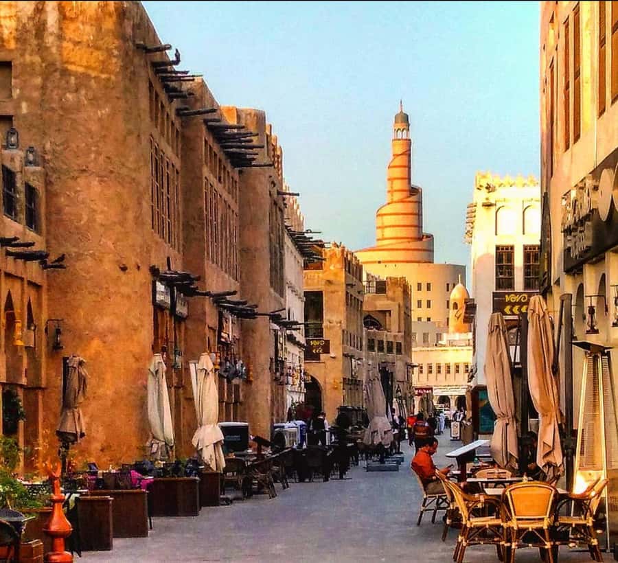 Doha: Combo City Tour and Desert Safari with Camel Ride - Souq Waqif, where the day begins with spice and falcons