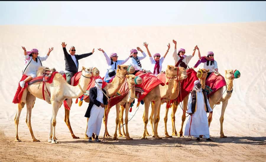 Doha: Desert Buggy Ride, Camel Ride, Dune Bashing, Sandboard - Sandboarding down the dunes