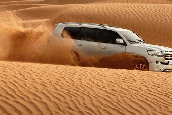 Doha Desert Quad Bike adventure with group, and Sand dune Driving - A camel ride for $10 adds a Bedouin touch