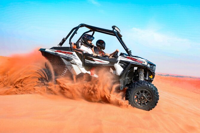 Doha Desert Quad Bike adventure with group, and Sand dune Driving - Sunset gives the final scene its value