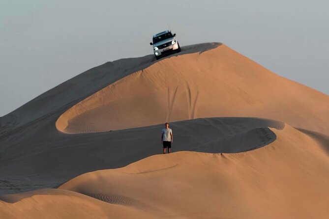 Doha: Desert Safari | Camel ride | Sand-boarding | Quad Biking - Sandboarding turns the dunes into a playground