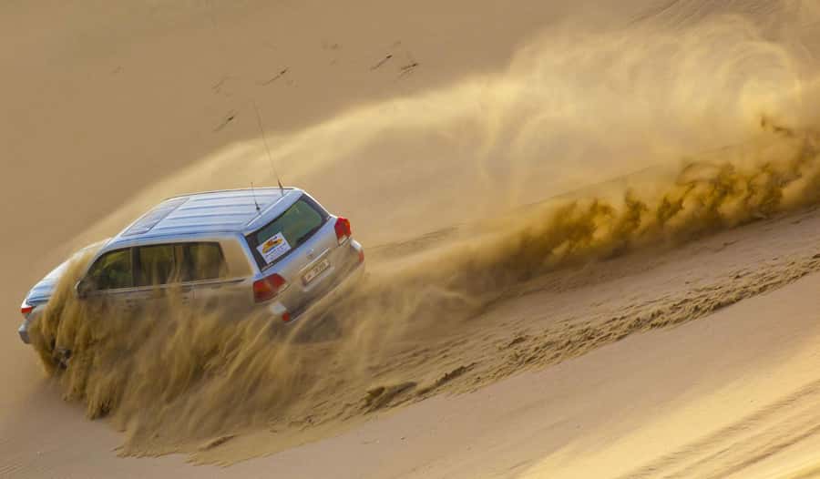 Doha Desert Safari, Camel Ride, Sandboarding & Inland Sea - A short camel ride with tea and coffee