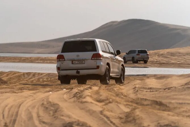Doha Desert Safari Dune Bashing Camel Ride - Dune bashing across Qatar’s golden sand