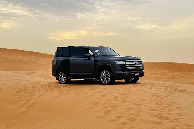 Doha: Desert Safari: Dune Bashing, Quad Bikes & Camel Rides - Sandboarding, dune bashing, and the roughest hour