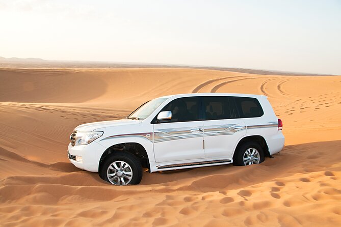 Doha Desert Safari Full day With Dinner,Dune Bashing,Sandboarding - Sandboarding and the optional camel ride