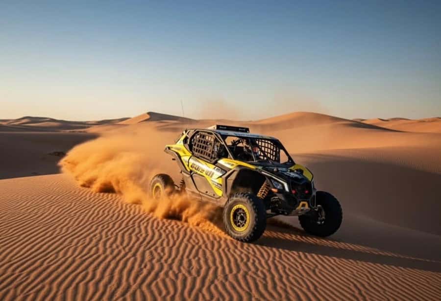 Doha: Desert Safari, Quad Bike, Camel Ride & Inland Sea Tour - Leaving Doha in a 4x4