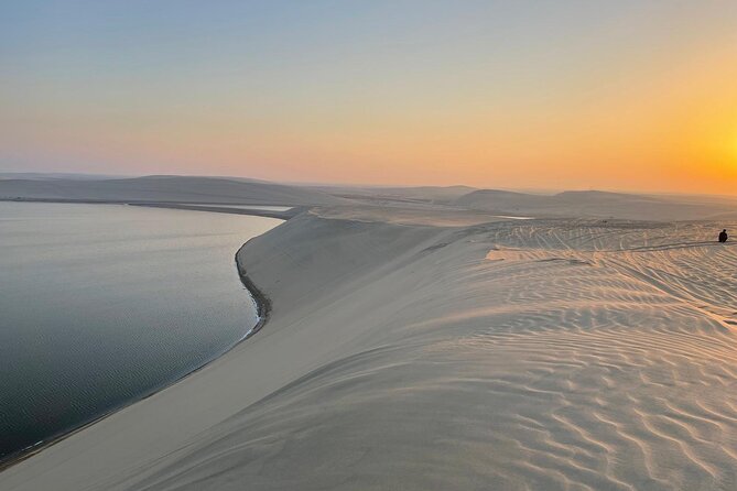 Doha: Desert Safari, Sand Boarding, Camel Ride & Inland Sea Tour - Dune bashing in a 4x4