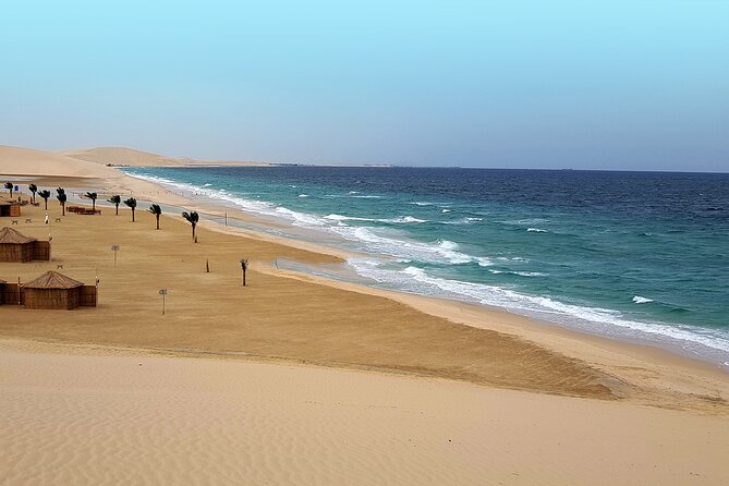Doha: Desert Safari With Quad bike ,Camel Ride And Sand Boarding - Sunrise over Qatar’s red dunes