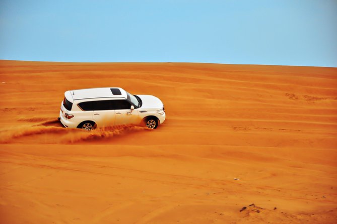 Doha: Desert Safari With Quad bike ,Camel Ride And Sand Boarding - Crossing the dunes to Khor Al Adaid