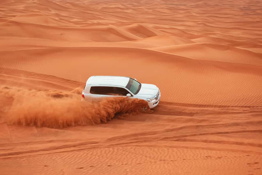 Doha: Desert Safari with Quad Bike, Sandboard & Camel Ride - The Inland Sea near Saudi Arabia