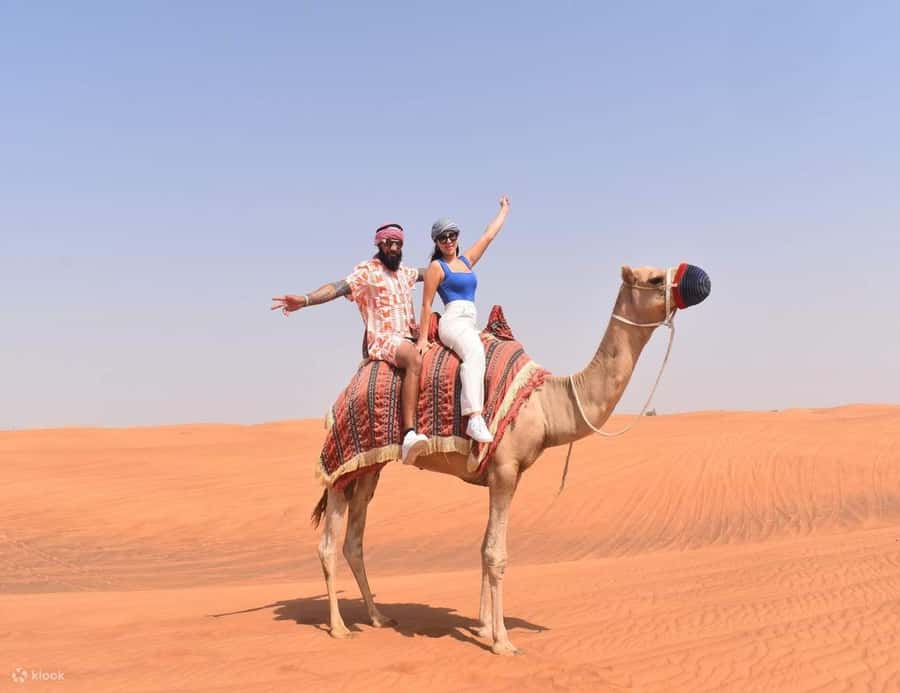 Doha: DesertSafari with Quad Bike, Camel Ride & Sandboarding - Camel area, Arabic tea, and a short ride