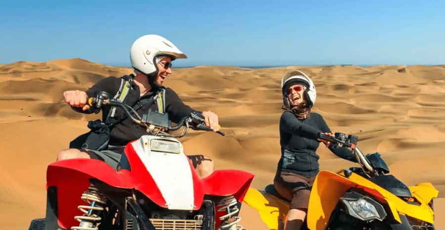 Doha: DesertSafari with Quad Bike, Camel Ride & Sandboarding - Sandboarding on soft golden dunes