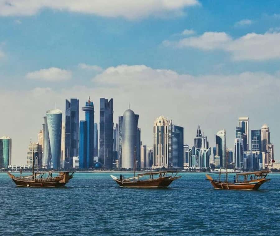 Doha: Dhow Cruise with Pickup, Drop-Off, Tea & Refreshments - Seeing Doha from a wooden dhow