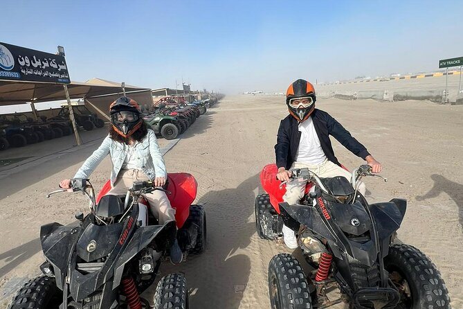 Doha Half Day Desert Safari Dune Bashing Camel Ride Sandboarding - Sandboarding beside the Inland Sea