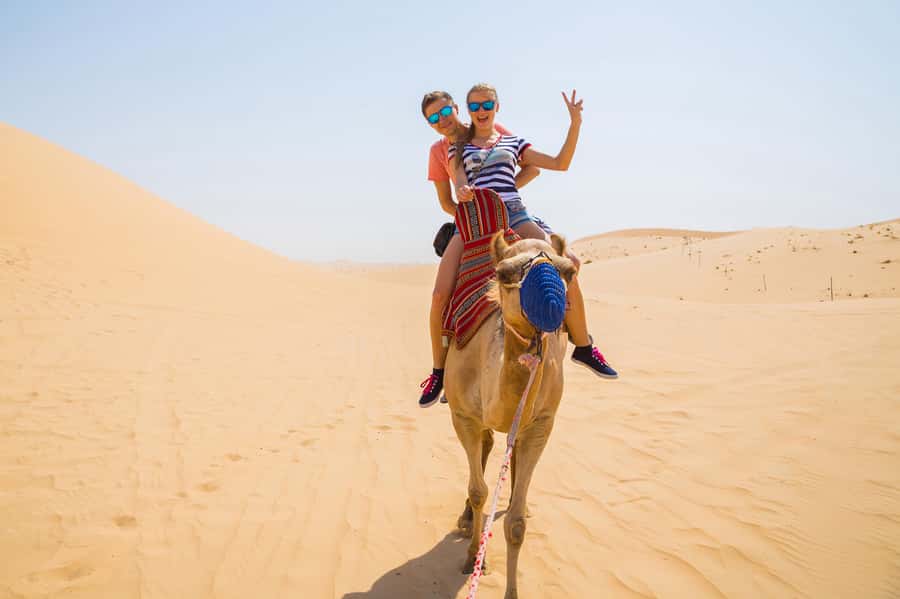 Doha: Half-Day Desert Safari, Quad Bike, Camels & Inland Sea - Camel photos before the fast stuff