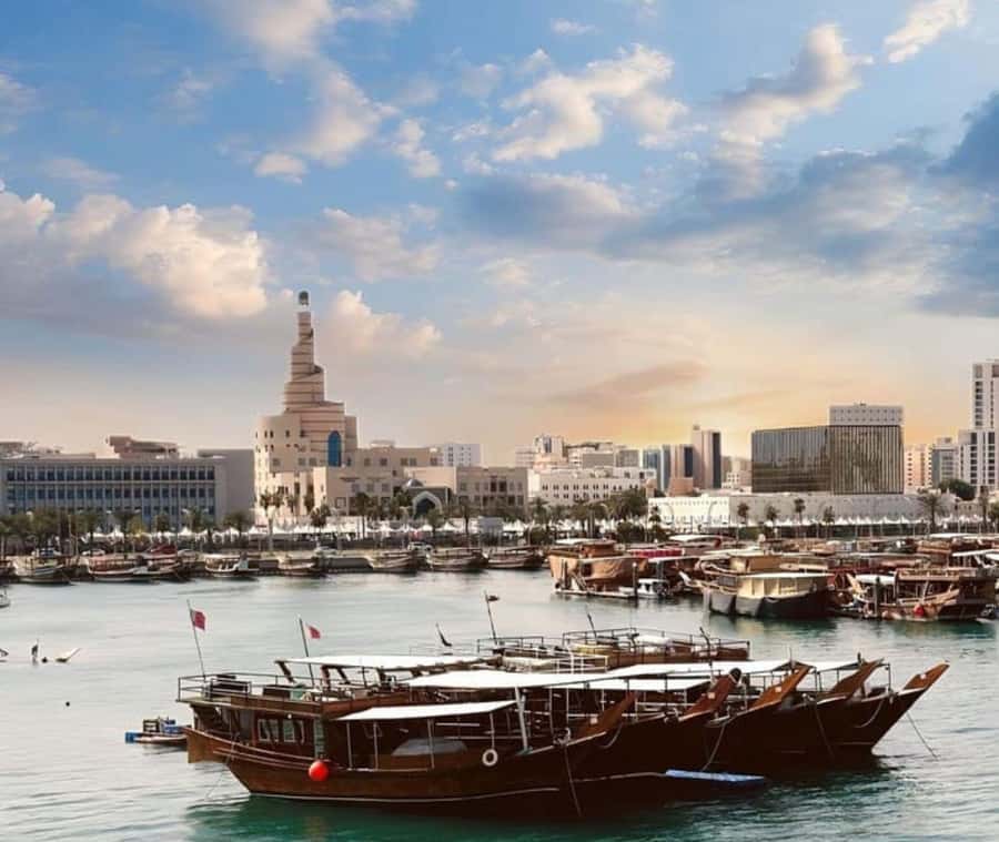Doha : Harbor Dhow Cruise Tour with Refreshments & Transfers - Sunset and city lights on the return route