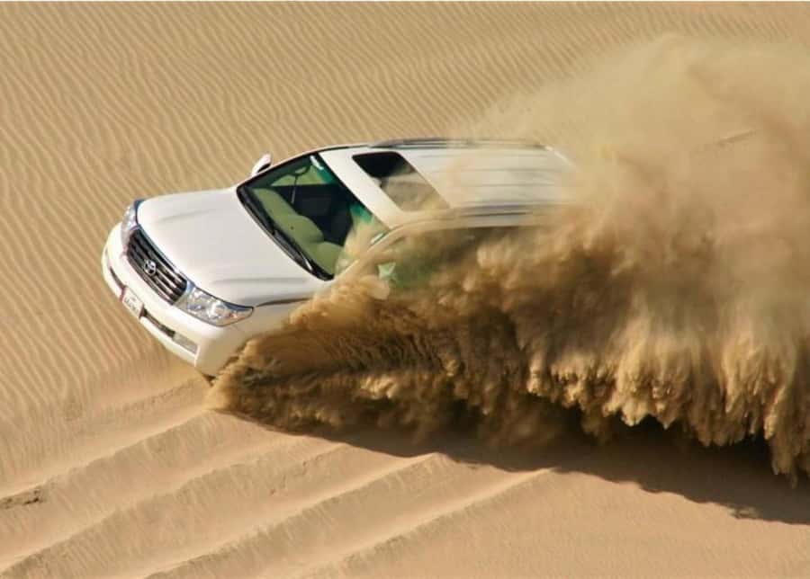 Doha : Inland Sea Desert Safari ,Camel Ride & Sandboarding - Starting with a quiet camel ride