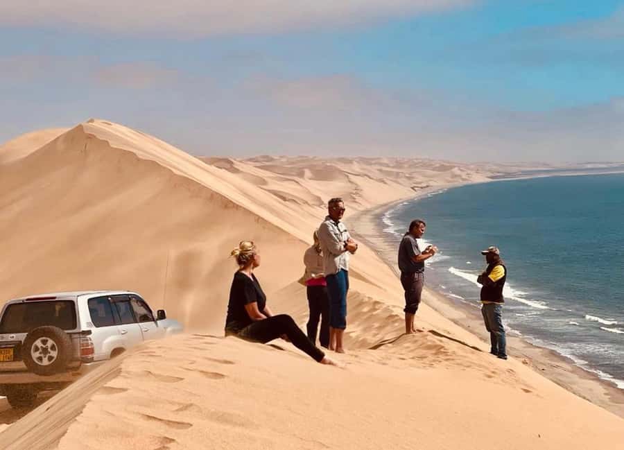 Doha: Inland Sea Desert Safari With All Activities - Dune bashing with a careful driver