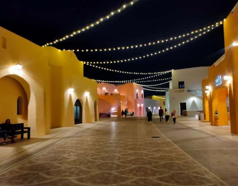 Doha: Mina District's Colorful Streets & Coastal Vibes Tour - Why Mina District feels different from central Doha