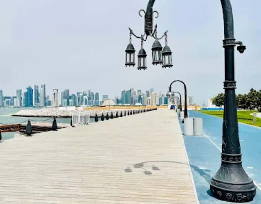 Doha: Mina District's Colorful Streets & Coastal Vibes Tour - The marina, fishing boats, and open air