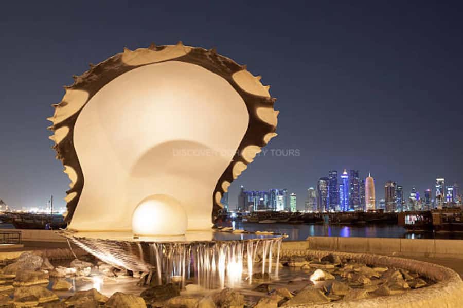 Doha: Night City Lights Tour with Arabian Dhow Cruise - Katara Cultural Village after sunset