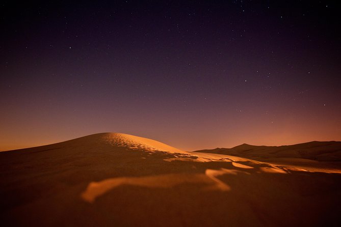 Doha Night Desert Safari Camel Ride Dune Bashing with Transfer - The Inland Sea, where sand meets water