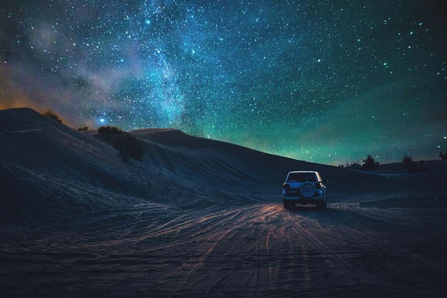 Doha: Overnight Desert Safari with Dinner and Breakfast - Sandboarding gives the dunes a playful side