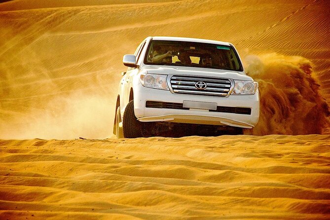 Doha: Private Half Day Desert Safari Tour in Qatar - Sealine Beach mixes dunes, water, and sandboarding