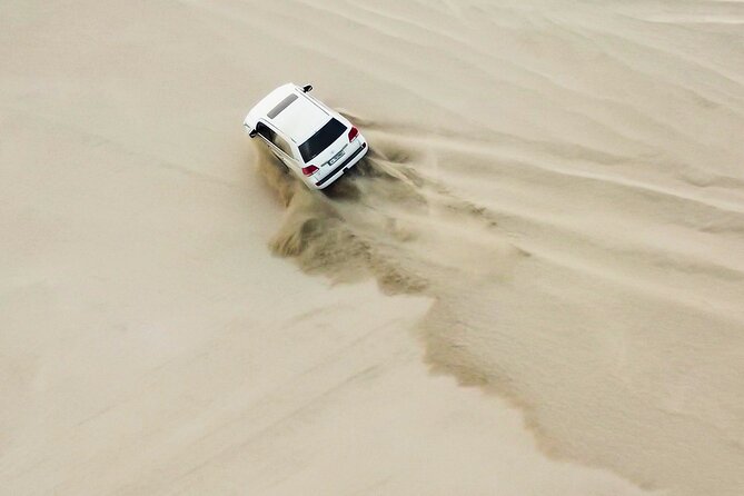 Doha-Private half day safari Sunrise/Sunset - From Doha to the open sands at Sealine Beach