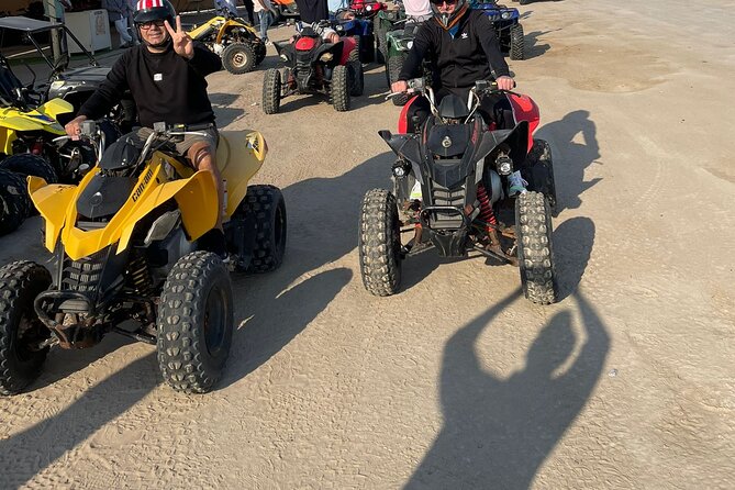 Doha Qatar ATV Quad Bike Buggy Dune Bashing and Camel Ride - Who will enjoy this outing most?