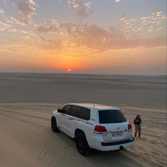 Doha Qatar : sealine adventure Camel Ride sandboard Sunset - The secret dune stop for sandboarding