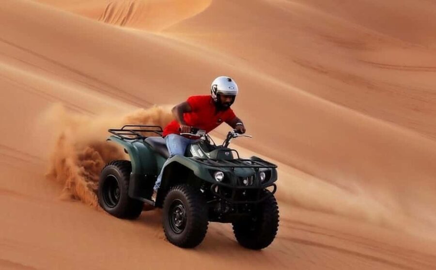 Doha: Quad bike, Camel ride,Sand boarding,Dune bashing - Four hours of desert action outside Doha