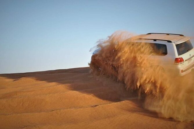 Doha: Quad Bike, Dune Bashing, Camel Ride & Inland Sea Tour - Sandboarding is a simple extra with little fuss