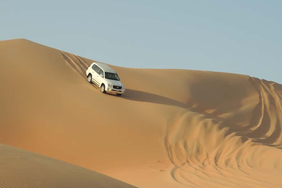 Doha Safari: ATV Ride, Dune Bashing, & Sandboarding Fun - Dune bashing across Qatar’s southern sands