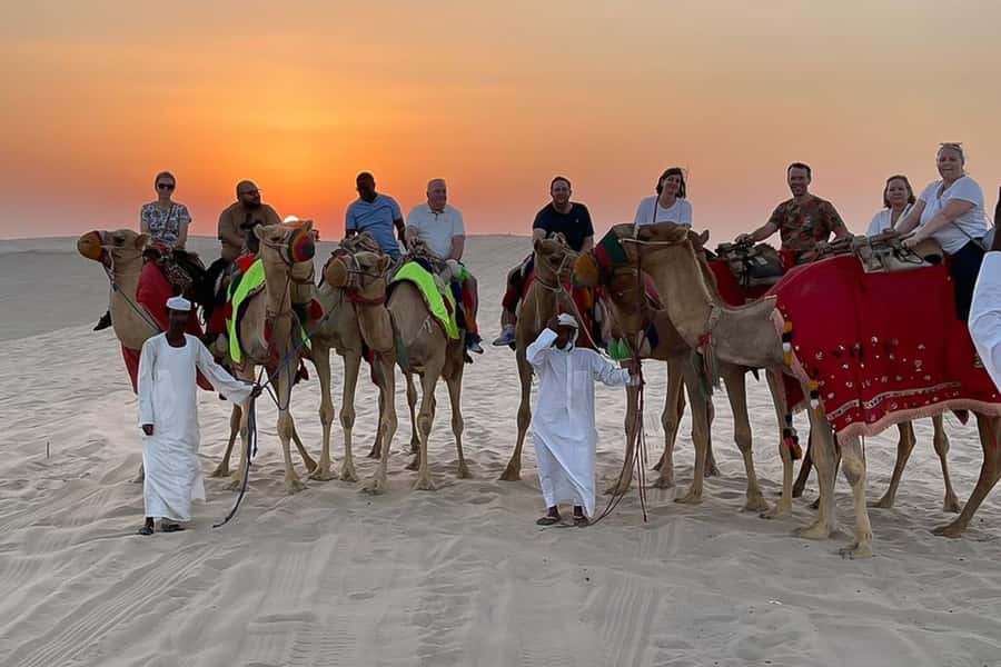 Doha Safari: ATV Ride, Dune Bashing, & Sandboarding Fun - Tea and camels at the local camp