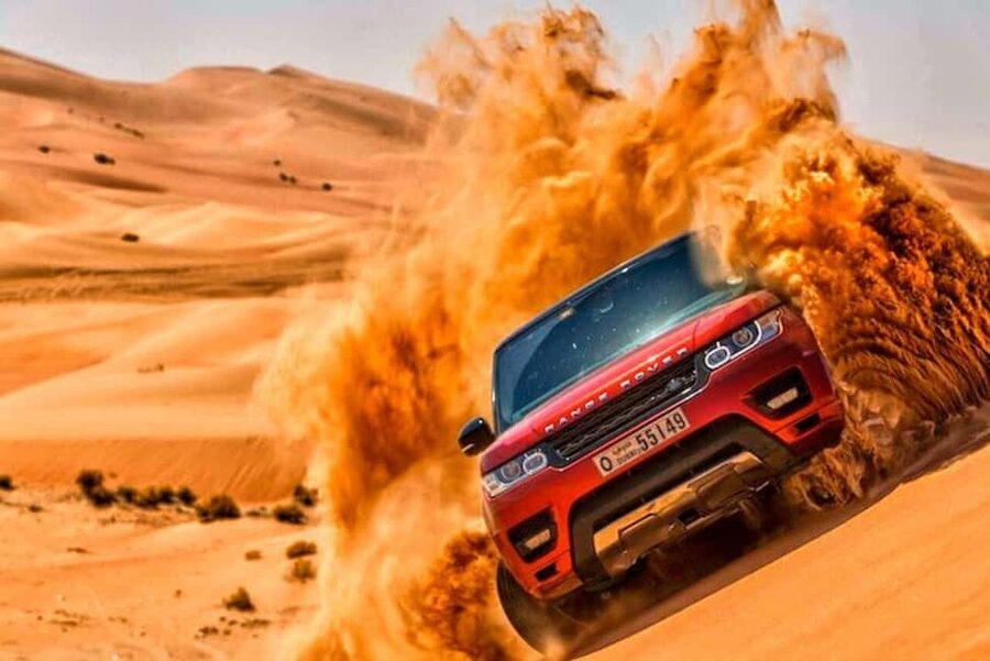 Doha Safari with Camel Ride, Inland Sea & Hotel Transfer - Dune bashing with a skilled 4x4 driver