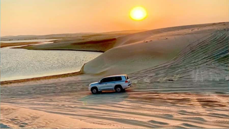 Doha :Sunrise/ Sunset Desert Safari CamelRide & Sandboarding - Leaving Doha in an air-conditioned 4x4
